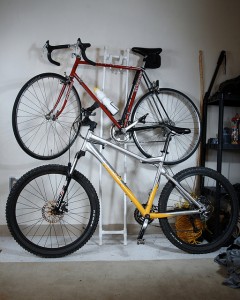 mountain bike and road bike mounted on wall