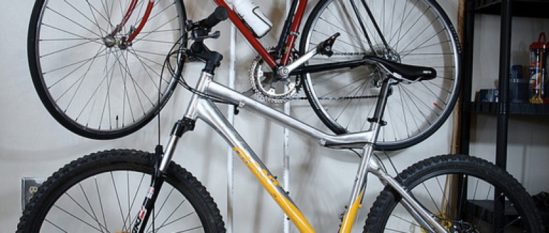 mountain bike and road bike mounted on wall